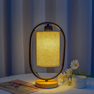 Nordic bedside table lamp with adjustable fabric shade and warm LED light