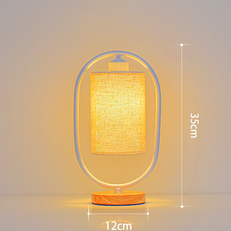 Elegant nightstand lamp with fabric lampshade and soft ambient lighting