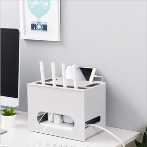 Caja de almacenamiento y organizador de cables con protección para la regleta